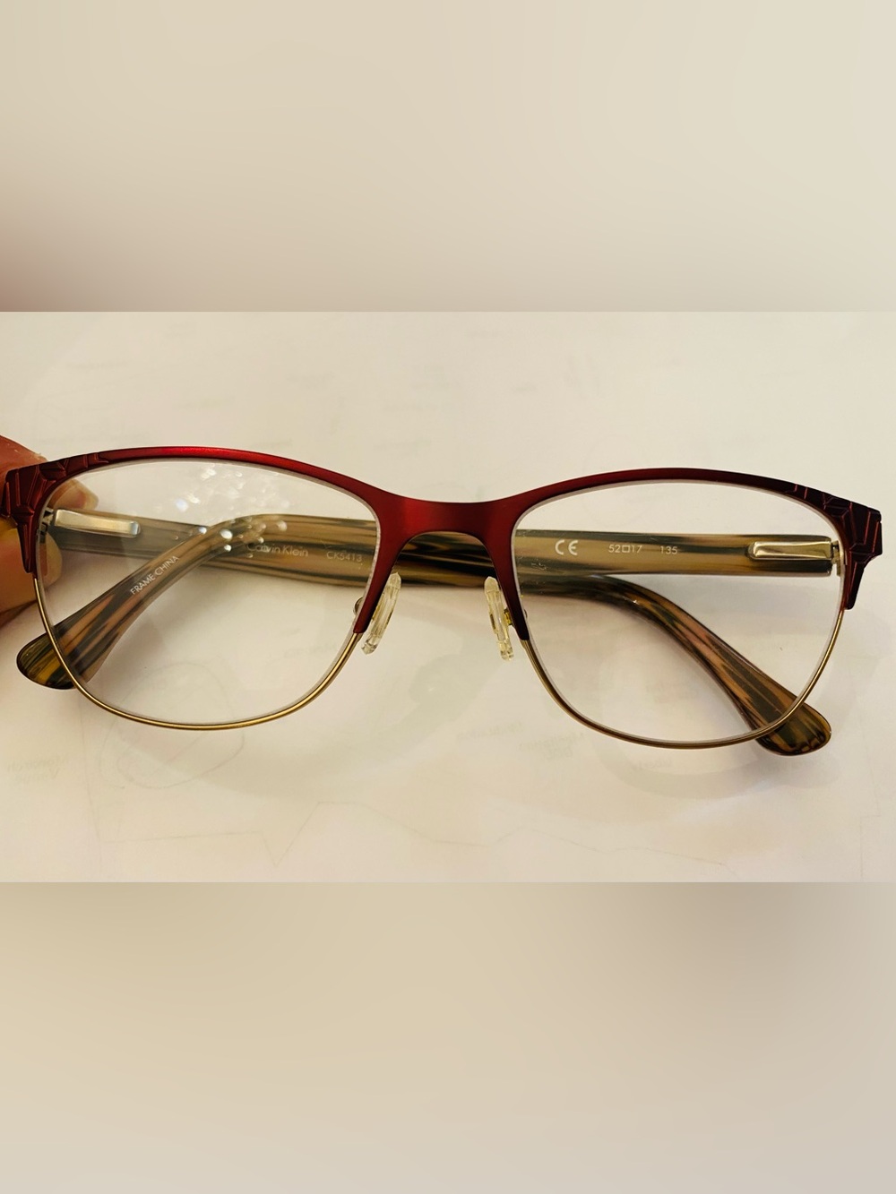 Calvin Klein Burgundy and Gold Metal Rimmed Eyeglasses